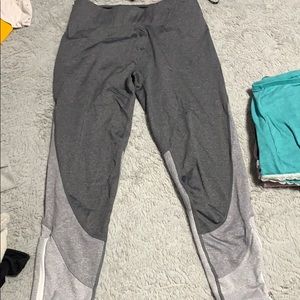 Grey work out leggings with zipper on leg